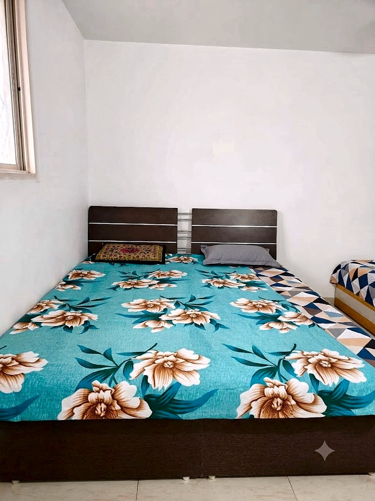Four sharing room with double beds for boys at Shivam PG Bopal, Ahmedabad