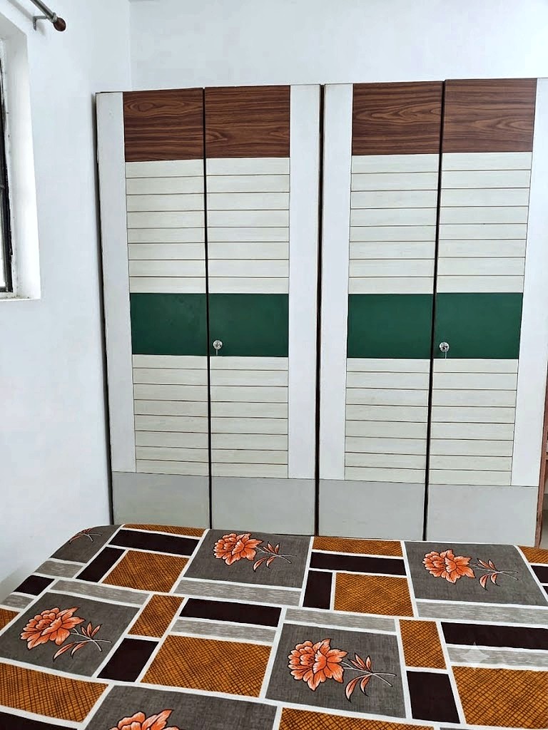 Four sharing room with double beds for boys at Shivam PG Bopal, Ahmedabad
