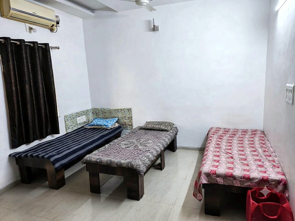Triple sharing AC room for boys at Shivam PG Bopal, Ahmedabad