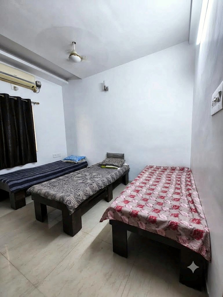 Triple sharing AC room for boys at Shivam PG Bopal, Ahmedabad