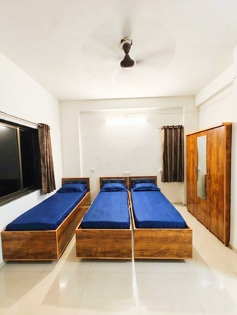 3 sharing room at Shivam PG, boys PG in Prahlad Nagar, Ahmedabad