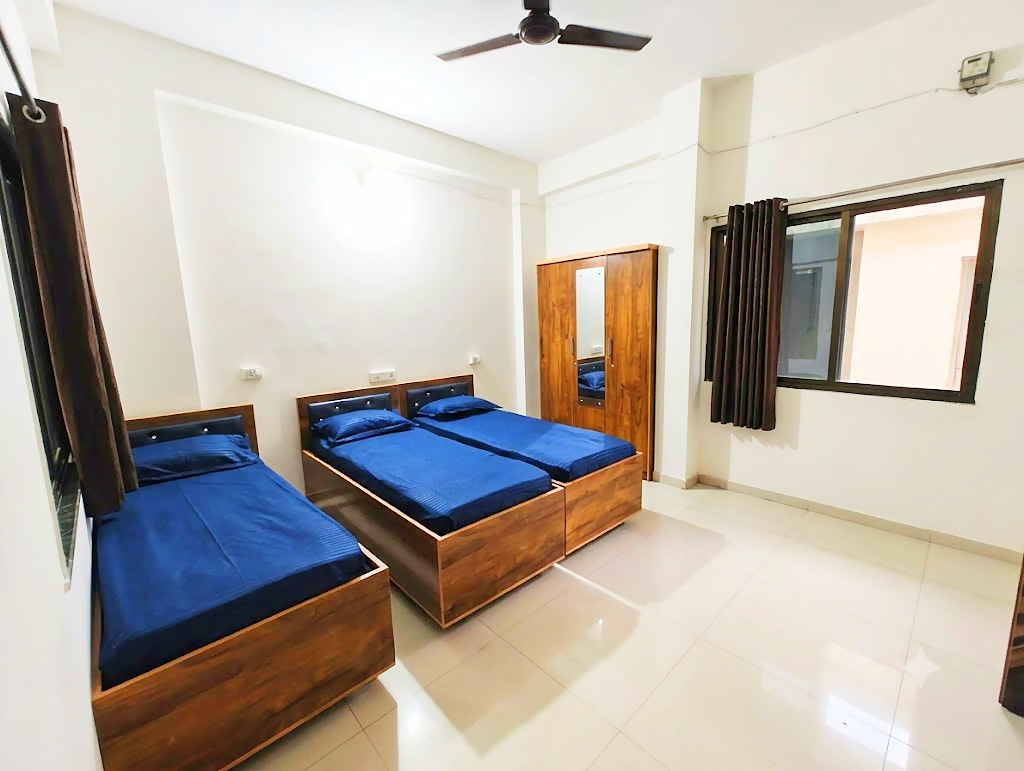 3 sharing room at Shivam PG, boys PG in Prahlad Nagar, Ahmedabad