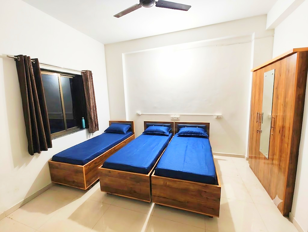 3 sharing room at Shivam PG, boys PG in Prahlad Nagar, Ahmedabad