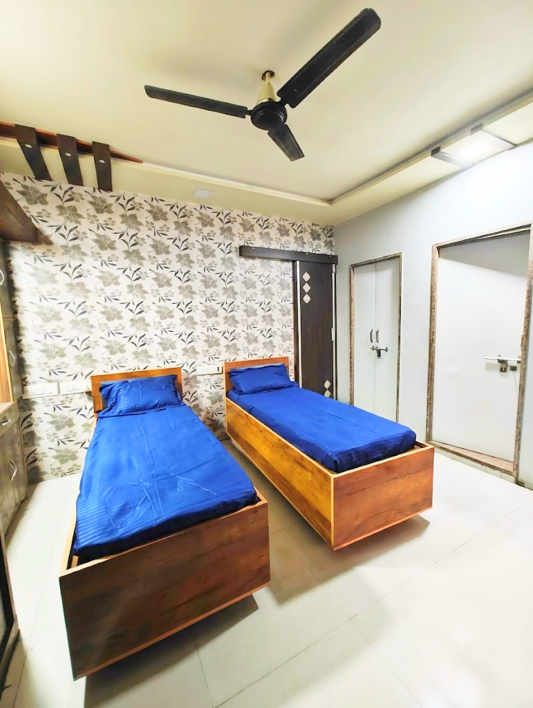 2 sharing room at Shivam PG, boys PG in Prahlad Nagar, Ahmedabad