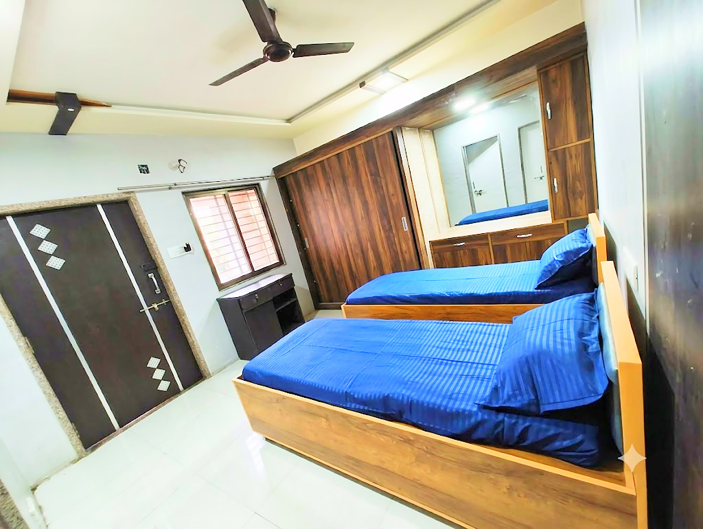 2 sharing room at Shivam PG, boys PG in Prahlad Nagar, Ahmedabad
