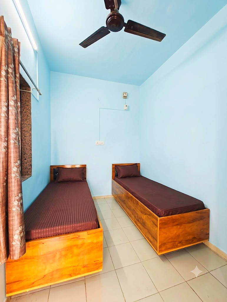 2 sharing room at Shivam PG, boys PG in Prahlad Nagar, Ahmedabad